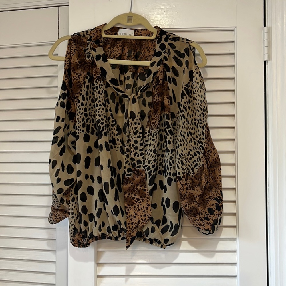 Geri c cold shoulder tie neck animal print blouse